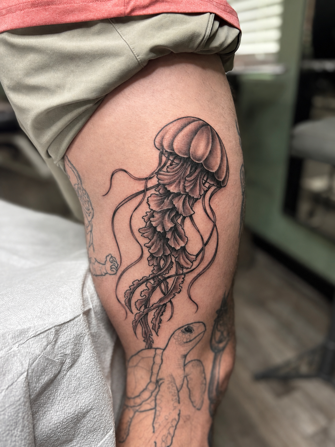 Black and grey portrait tattoo by Propaganda Tattoo in San Diego