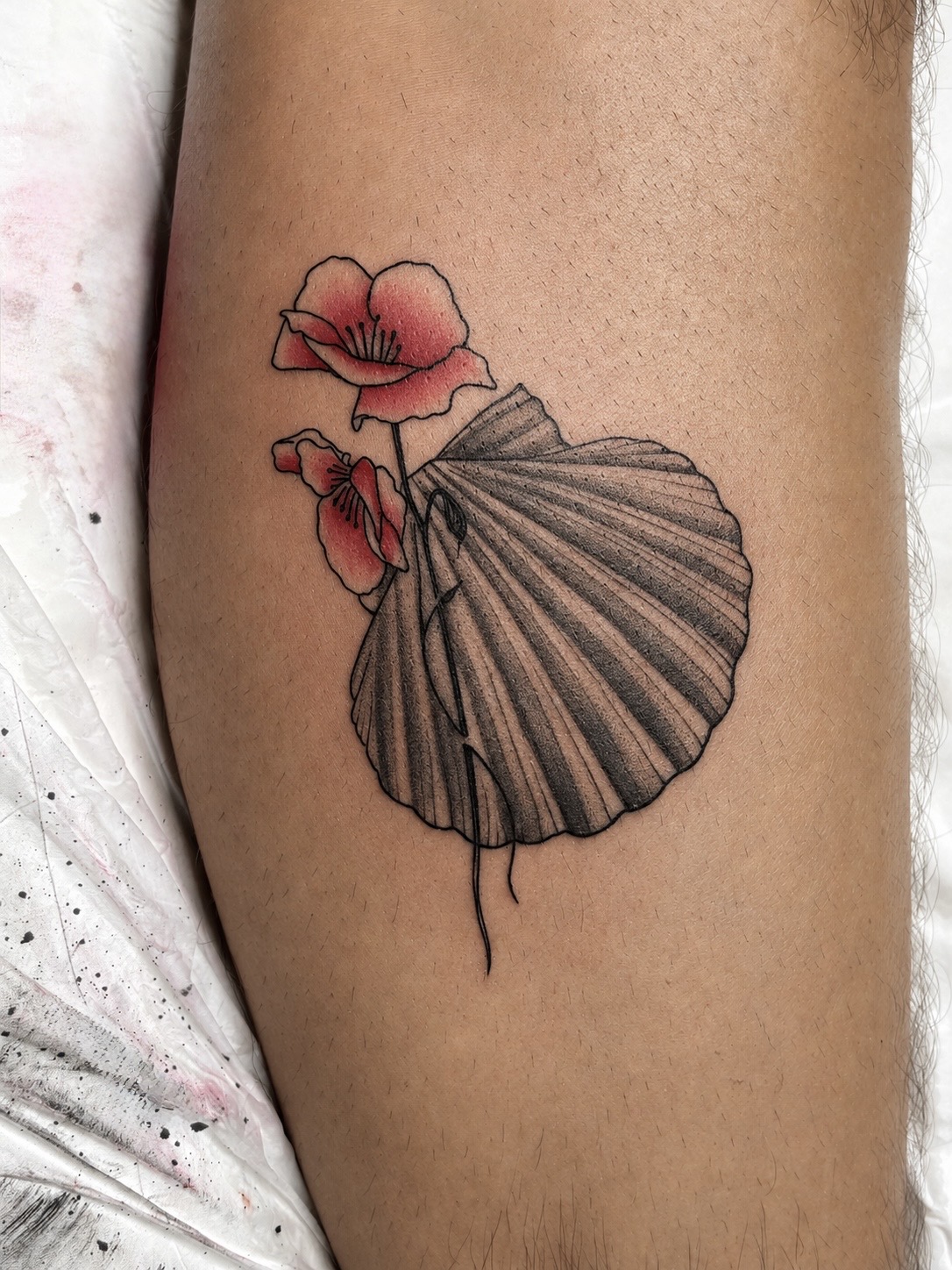 Fine Line seashell and flower tattoo by Teer at Propaganda Tattoo in San Diego
