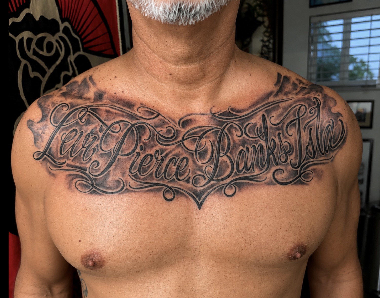 script chest rocker tattoo by Teer at Propaganda Tattoo in San Diego