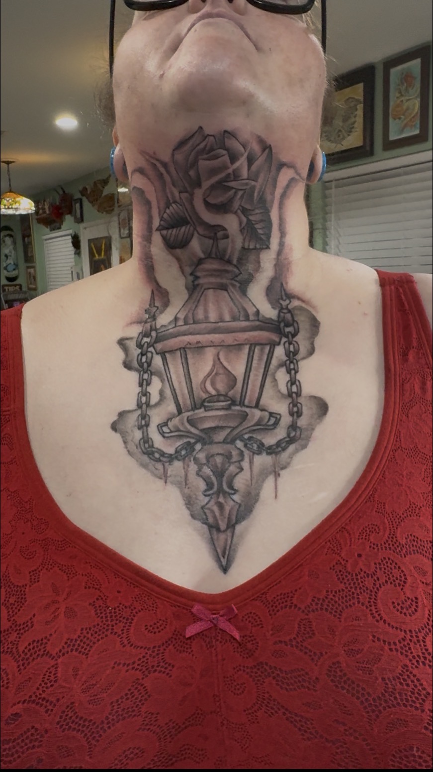 Black and gray Lantern and rose chest and throat tattoo by Teer at Propaganda Tattoo in San Diego